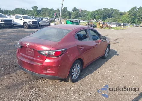 2018 Toyota Yaris Ia из США, поврежденный, VIN 3MYDLBYV9JY315957